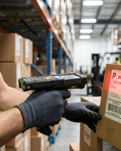 Close-up_shot_of_warehouse_worker_hands_scanning_p-1770116717030-BD